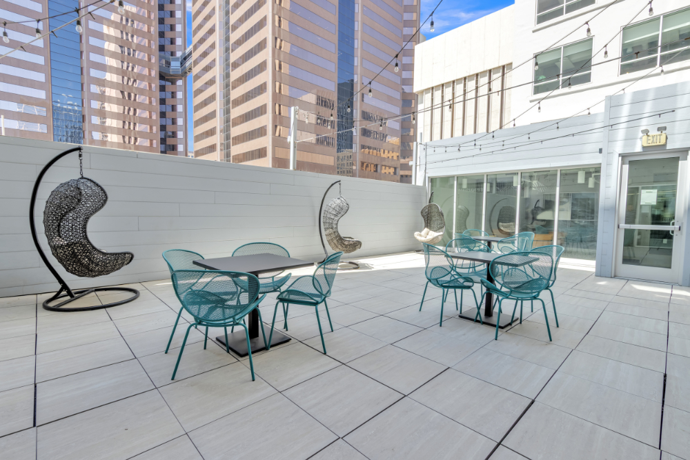 The Monroe Patio meeting and event space The Monroe Patio at the Heard Building arranged for an outdoor gathering